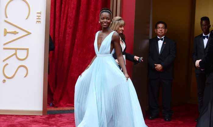 Lupita Nyong'o arrives at the Oscars on Sunday, March 2, 2014, at the Dolby Theatre in Los Angeles. (Photo by Jordan Strauss/Invision/AP)