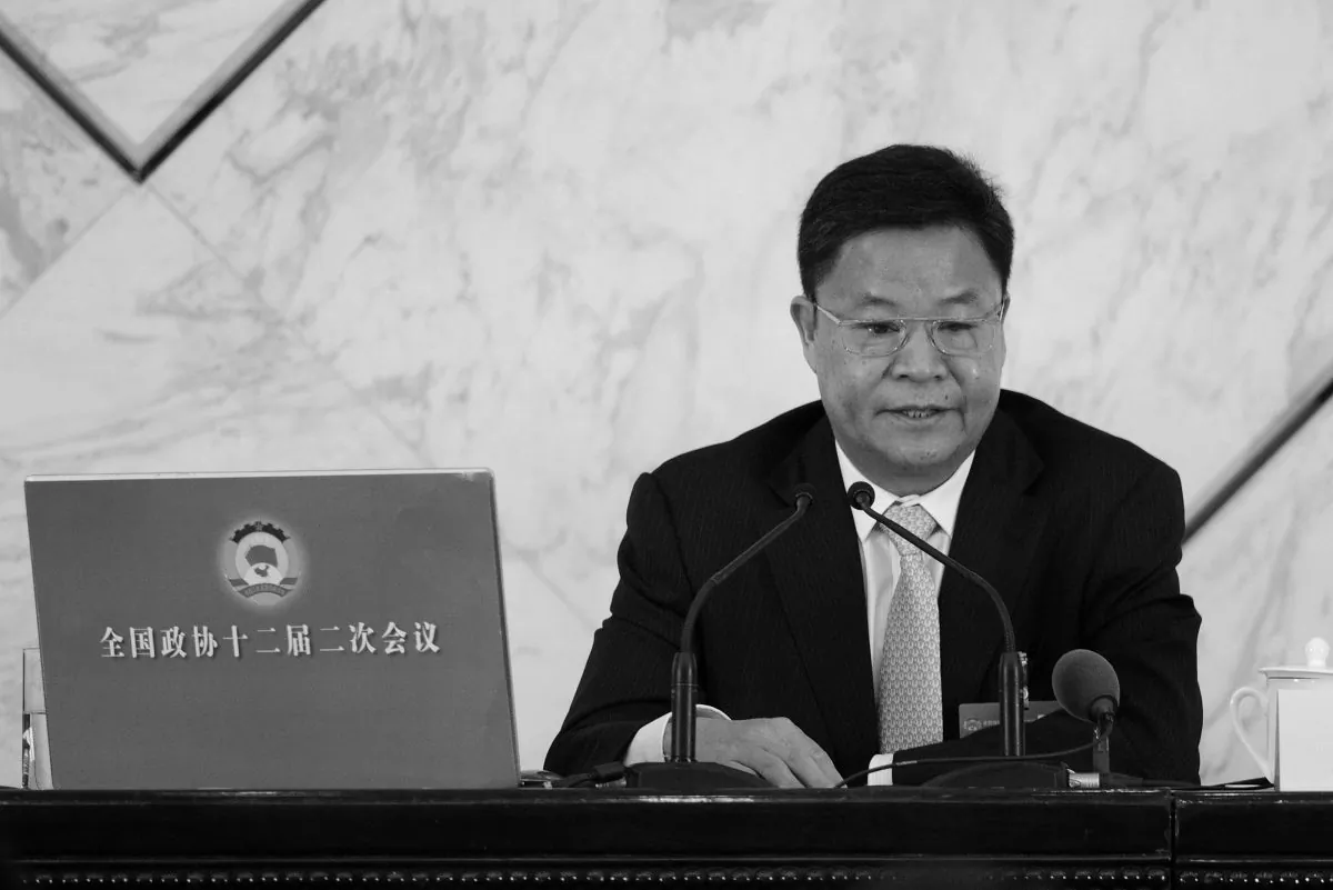 Lü Xinhua, an official spokesman, attends a press conference at the Great Hall of the People in Beijing on March 2, 2014. Lü all but acknowledged that Zhou Yongkang, the former security czar, is in trouble. (Wang Zhao/AFP/Getty Images)
