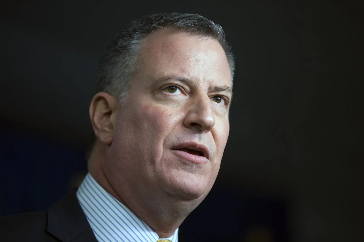 Mayor Bill de Blasio speaks during a news conference before a game between the New York Mets and Washington Nationals at CitiField on Monday. (John Minchillo/AP)