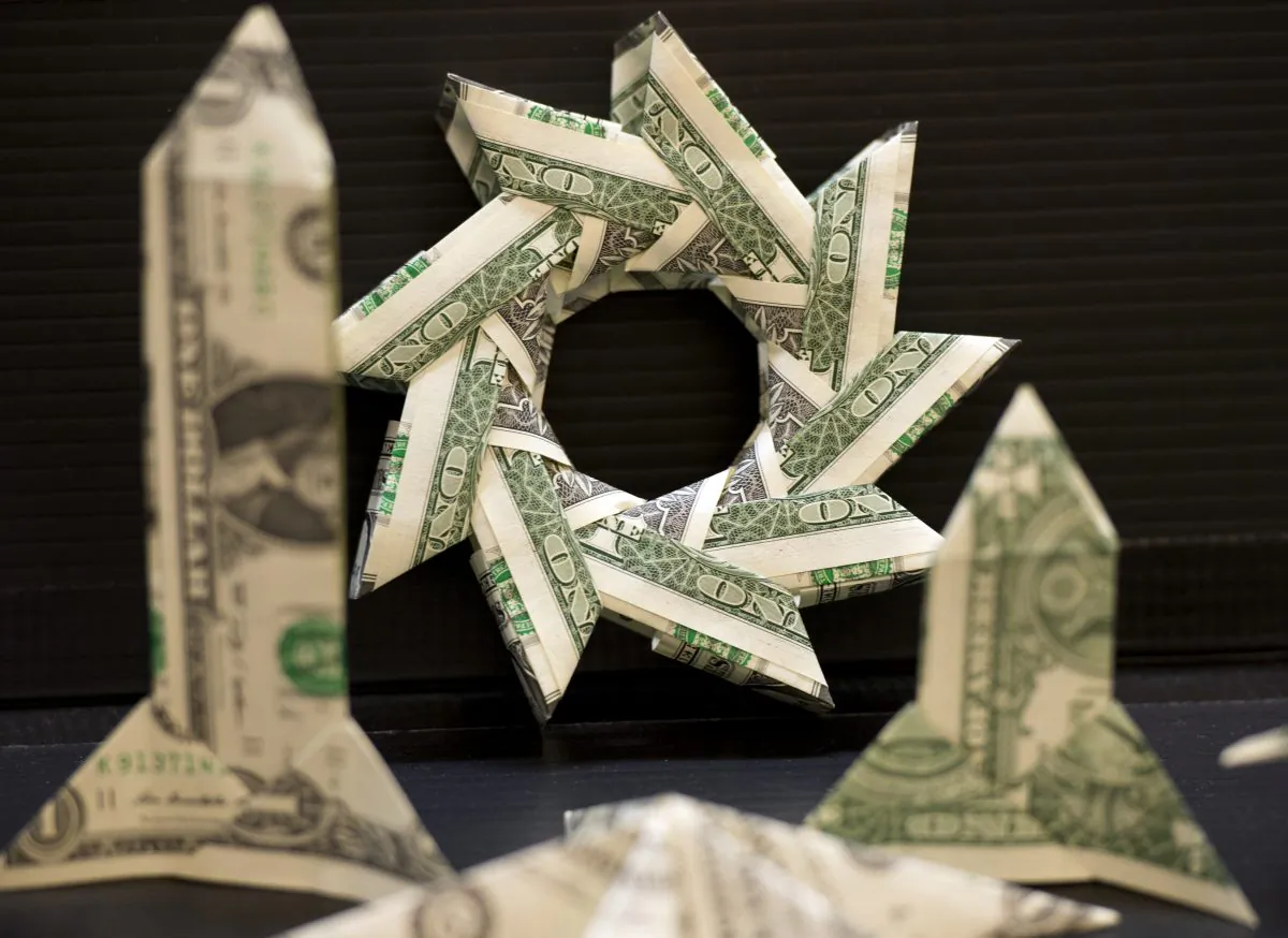 Origami made from dollar bills on display at the Origami Convention at the Fashion Institute of Technology in New York on June 22, 2013. (Don Emmert/AFP/Getty Images)