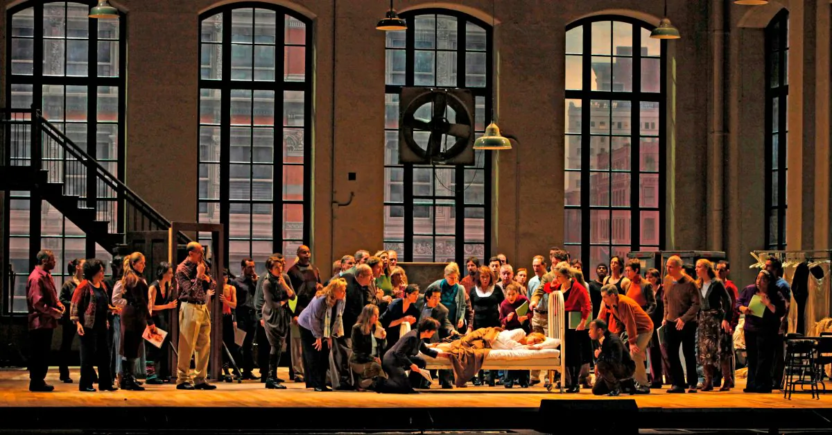 Diana Damrau (in bed) sings the title role in a revival of Bellini’s “La Sonnambula.” (Ken Howard/Metropolitan Opera)
