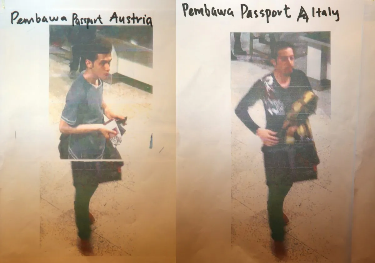 Imagery released by police of an Iranian suspect, Pouria Nour Mohammad Mehrdad (L), who was traveling on Flight MH370 with a stolen Austrian passport, and Seyed Mohammed Rezar Delawar, who was traveling on the same flight with a stolen Italian passport, in Kuala Lumpur, Malaysia, on March 11, 2014. (How Foo Yeen/Getty Images)