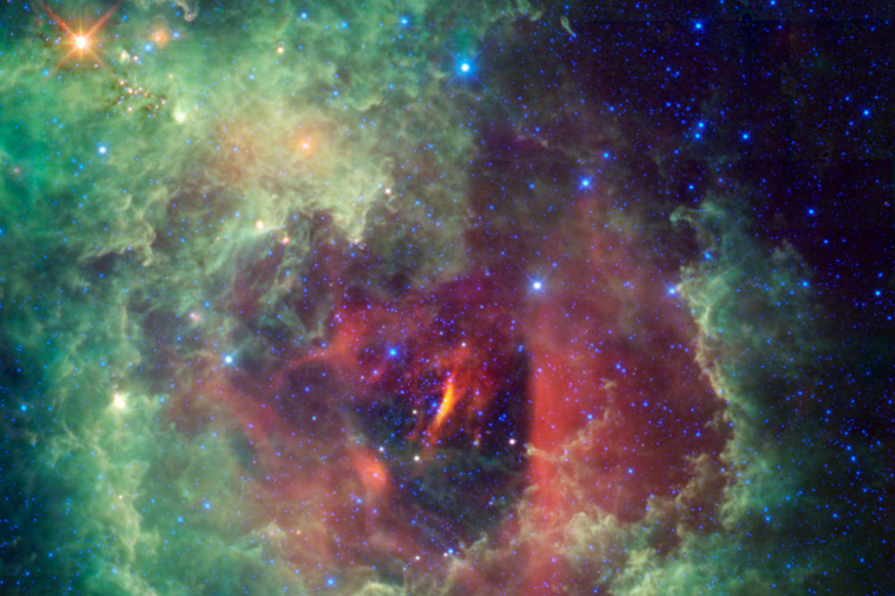 Unicorns and roses are usually the stuff of fairy tales, but this cosmic image taken by NASA's Wide-field Infrared Explorer (WISE) shows the Rosette nebula located within the constellation Monoceros, or the Unicorn. This flower-shaped nebula, also known by the less romantic name NGC 2237, is a huge star-forming cloud of dust and gas in our Milky Way galaxy. Estimates of the nebula's distance vary from 4,500 to 5,000 light-years away. (NASA/JPL-Caltech/UCLA) 