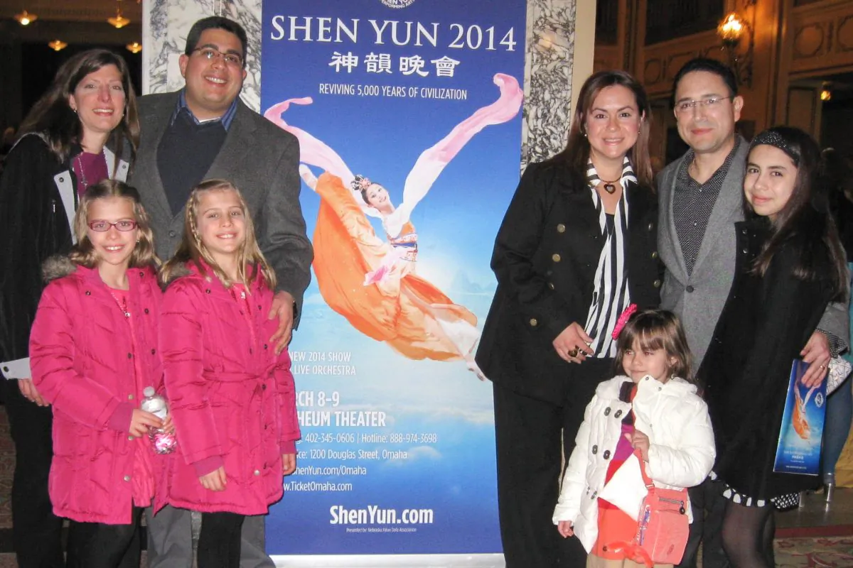 Doctors Diego Torres, Douglas Inciard, and their families attended Shen Yun Performing Arts, at Omaha’s Orpheum Theater, on March 8. (Cat Howland/Epoch Times)
