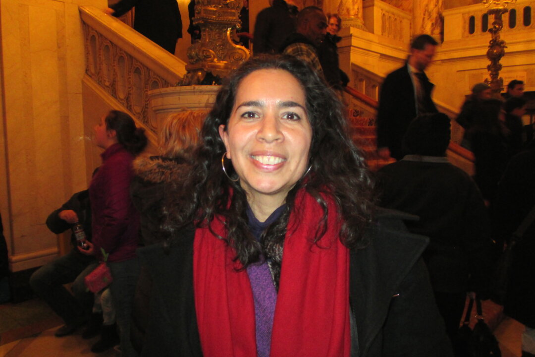Rosa Gonzalez enjoys Shen Yun Performing Arts at the Citi Wang Theatre in Boston, on Feb. 28. (Catherine Yang/Epoch Times)