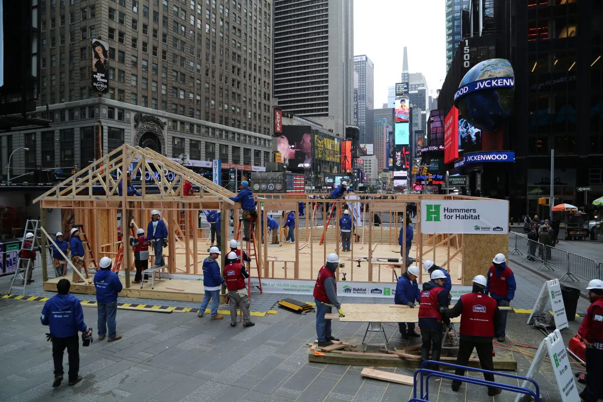 Habitat for Humanity and Lowe's volunteers build a home for a Sandy victim on March 20, 2014 in Times Square, NYC. (Courtesy of Habitat for Humanity)