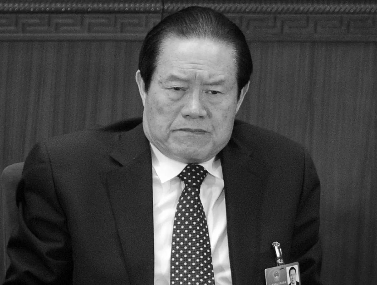 Zhou Yongkang, former member of the Politburo Standing Committee, attends the opening session of the National People's Congress (NPC) in Beijing on March 5, 2012. Zhou is in the middle of a political downfall, with high-profile revelations of corruption leveled against his family in the press. (Liu Jin/AFP/Getty Images)
