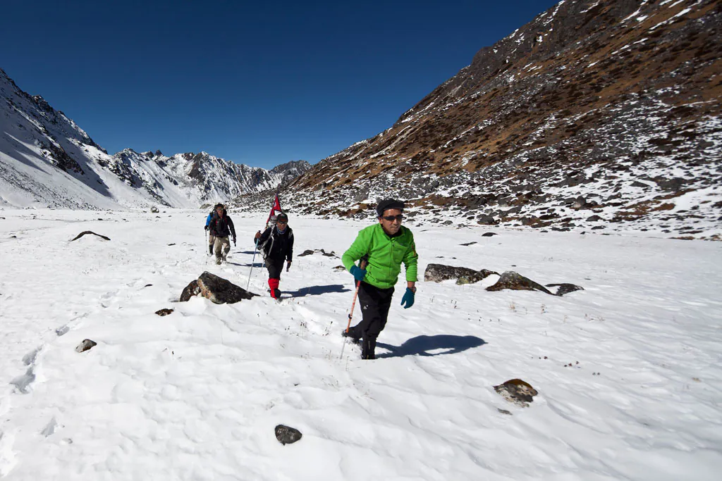 Nepalese mountaineer Apa Sherpa, who has scaled Mount Everest a record-breaking 21 times, is photographed while on the Great Himalaya Trail, one of the longest and highest trekking routes in the world, in the Nepalese Himalayas on January 22, 2012. (Sameer Jung Thapa/AFP/Getty Images)