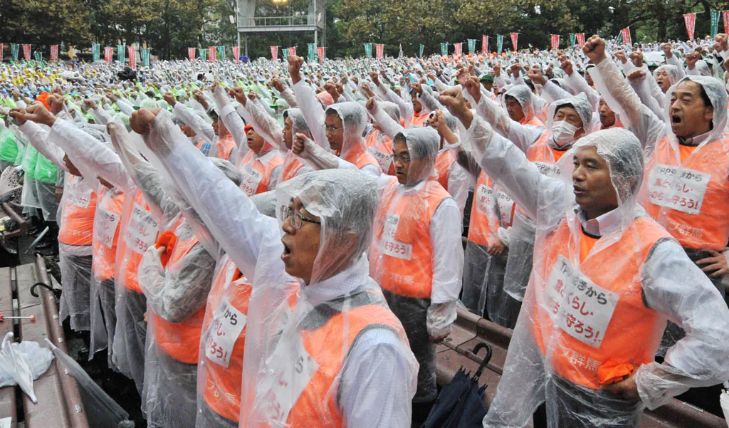 Members of the JA group (Central Union of Agricultural Cooperatives) attend an anti Trans-Pacific Partnership (TPP) rally in Tokyo on October 2, 2013. Some 3,500 activists on October 2 staged a rally demanding the stop of TPP free trade negotiations. (Kazuhiro Nogi/AFP/Getty Images)
