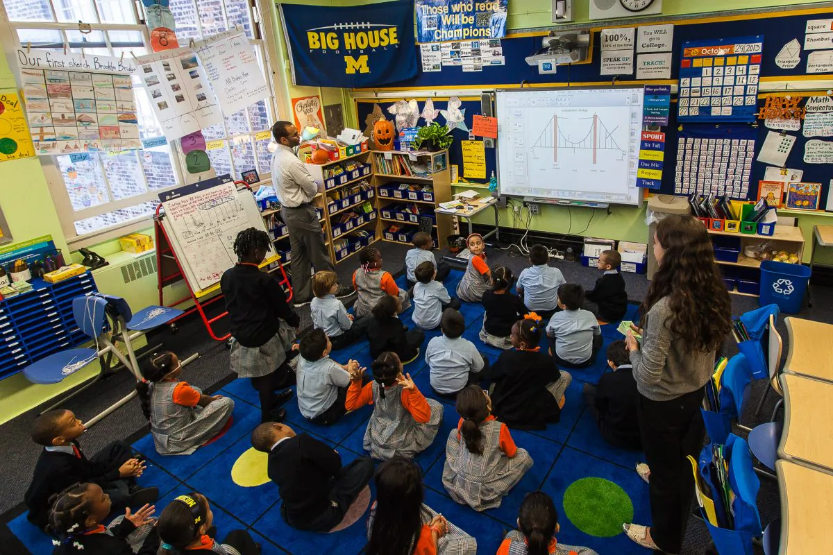 Students answer questions in a class at Success Academy Williamsburg, Brooklyn, New York, Oct. 29, 2013. (Petr Svab/Epoch Times)