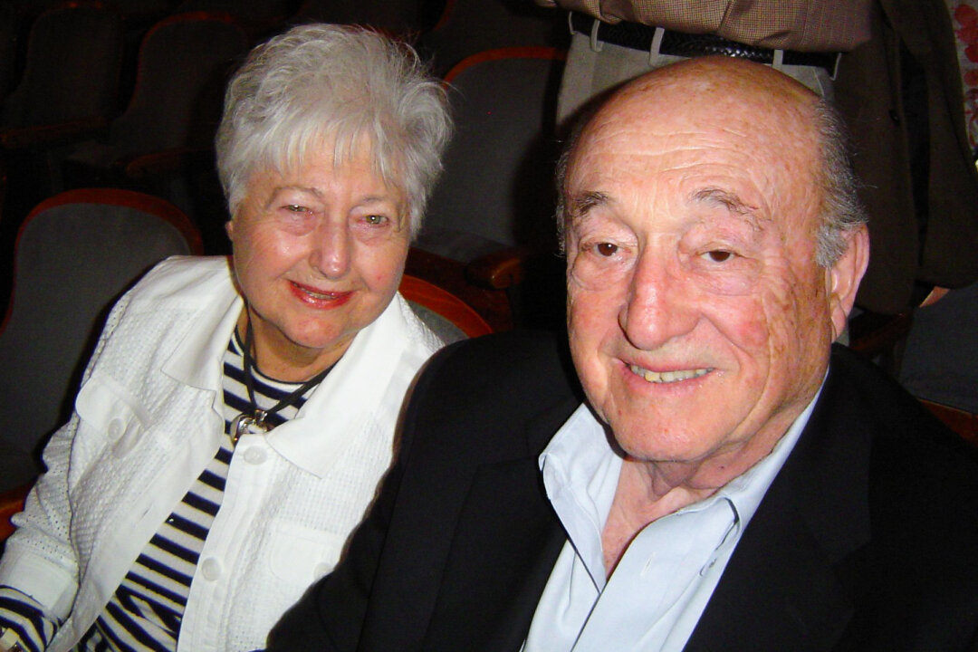 Andrew Flager  along with his wife  attending Shen Yun Performing Arts at Philadelphia's Merriam Theater on April 26, 2014. (Epoch Times)