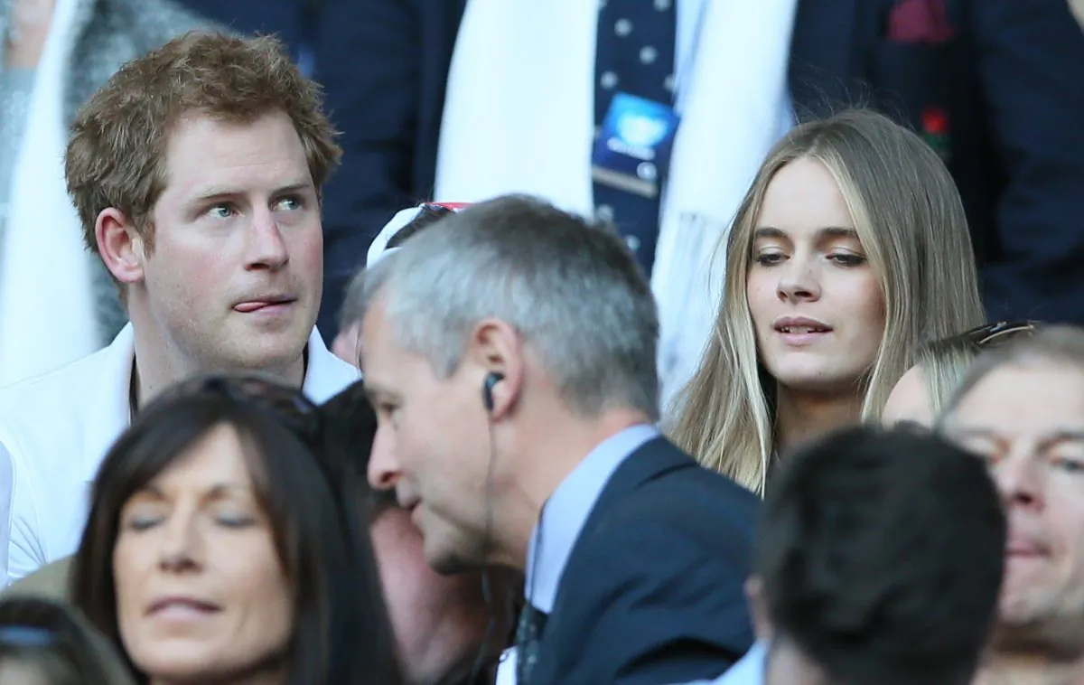FILE - A Sunday, March 9, 2014 photo from files showing Britain's Prince Harry, top left, with his girlfriend Cressida Bonas, top right,  as they attend the Six Nations Rugby Union match between England and Wales at Twickenham stadium in London. British news media are reporting that Prince Harry and his girlfriend Cressida Bonas have split up. Press Association cited an unidentified source as saying that Harry, 29, and Bonas, 25, had decided to end their two-year relationship. Other news media _ including the BBC, the Daily Mail and The Sun _ also reported the breakup, giving no sources. Royal officials declined to comment.(AP Photo/Alastair Grant, File)
