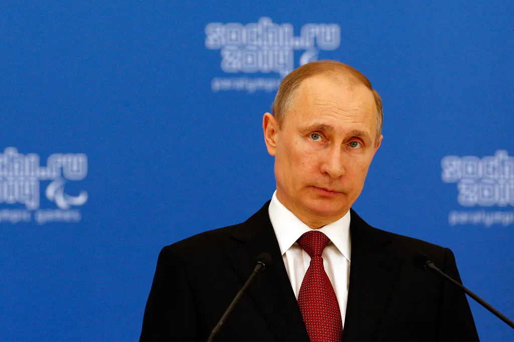 Russian President Vladimir Putin looks on during a lunch hosted by the office of the Russian President Vladimir Putin for the Presidents of the International Paralympic Committee member organisations during the 2014 Sochi Paralympic Games on March 13, 2014 in Sochi, Russia. (Harry Engels/Getty Images)