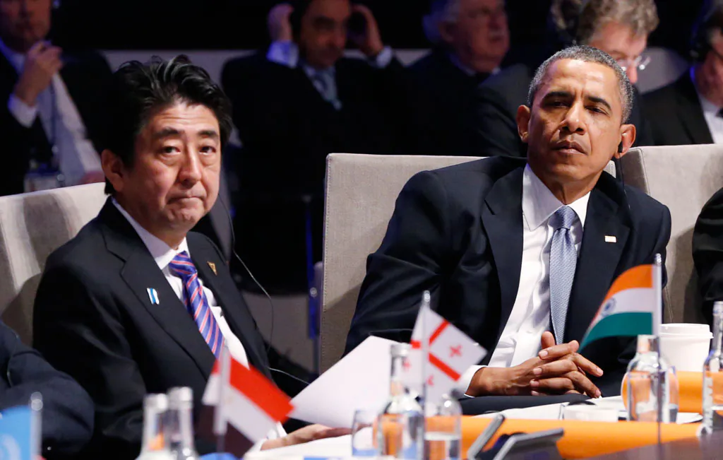 Japan's Prime Minister Shinzo Abe and U.S. President Barack Obama (R) attend the opening session of the at the 2014 Nuclear Security Summit on March 24, 2014 in The Hague, Netherlands. (Yves Herman/Getty Images)