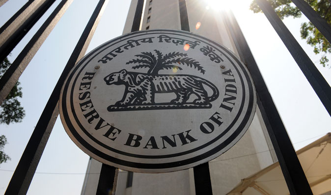 An Reserve Bank of India (RBI) logo is seen on the main entrance gate of the RBI headquarters in Mumbai on April 1, 2014. India's central bank kept key interest rates steady in a widely anticipated move less than a week before the start of national elections, due to start April 7. (Indranil Makherjee/AFP/Getty Images)