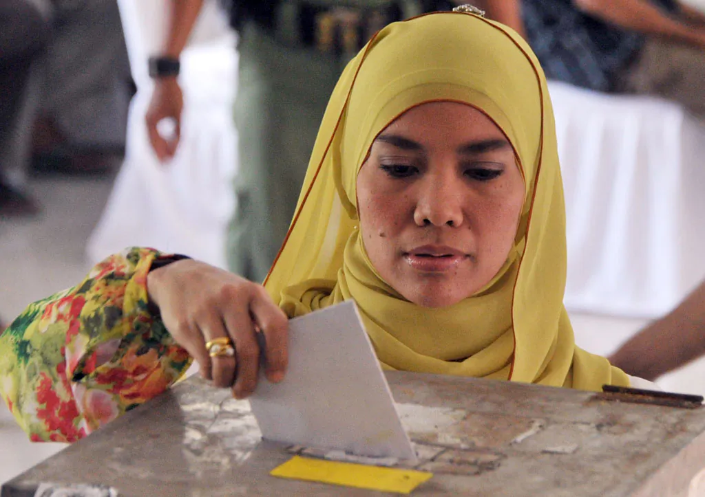 Indonesians cast at polling station during the legislative election in Jakarta on April 9, 2014. Indonesians vote in parliamentary polls expected to boost the main opposition party and move their popular presidential candidate, 52-year-old Jakarta Governor Joko Widodo popularly known by his nickname 'Jokowi', a step closer to becoming the country's next leader in the July presidential election. (Bay Ismoyo/AFP/Getty Images)