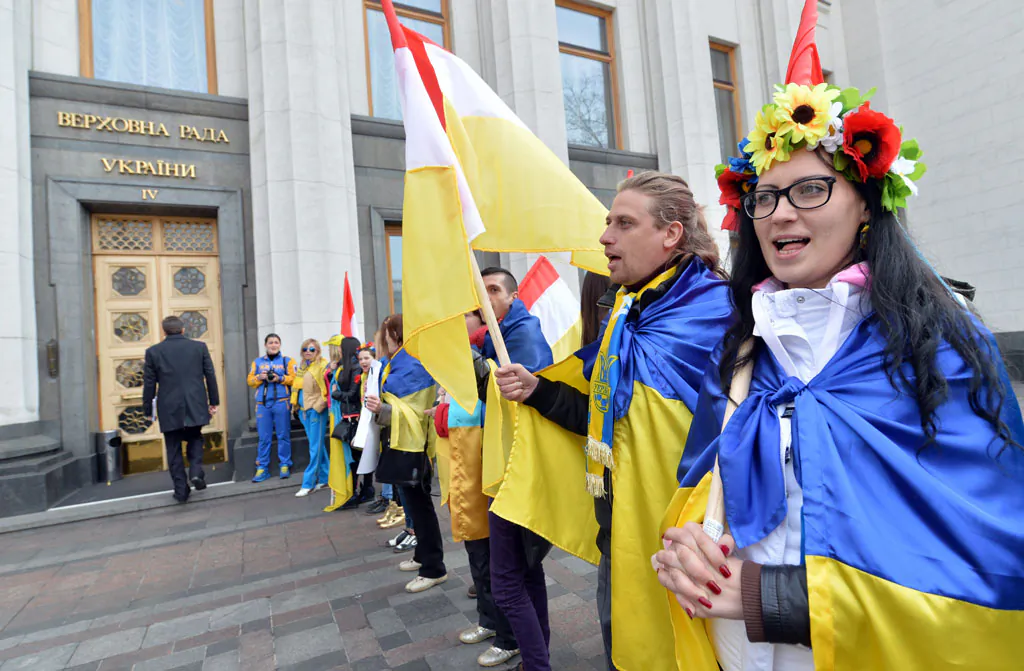 Protesters rally outside the Ukrainian Parliament in Kiev on April 15, 2014, during a session as they demand from the authorities actions against separatism on the eastern part of the country. Russian Foreign Minister Sergei Lavrov on Tuesday warned Kiev against using force to quell pro-Moscow separatists in eastern Ukraine, saying the 'criminal' act would undermine talks planned in Geneva. (Sergei Supinsky/AFP/Getty Images)