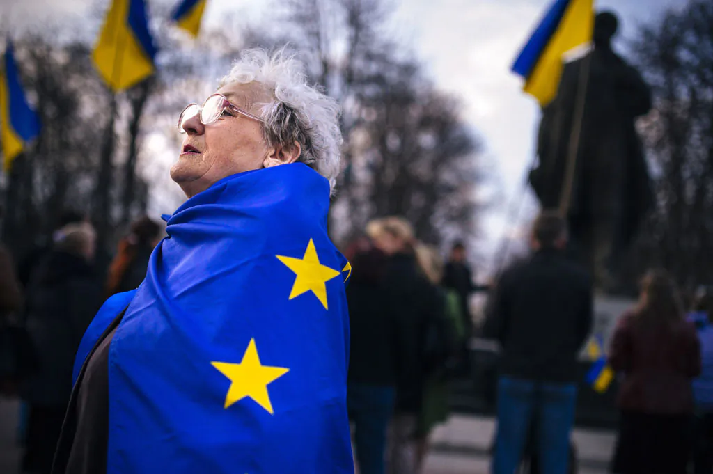 An elderly woman wrapped with an European Union flag attends a pro-Ukraine rally in the eastern Ukrainian city of Lugansk on April 15, 2014. Russia's foreign minister on April 15 warned Kyiv against using force to quell pro-Moscow separatists in eastern Ukraine, saying the "criminal" act would undermine talks planned in Geneva. Ukraine's Western-backed leader on April 15 accused Russia of trying to enflame the country's southeast but said he would proceed cautiously against pro-Kremlin militias consolidating control in the volatile region. (Dimitar Dilkoff/AFP/Getty Images)