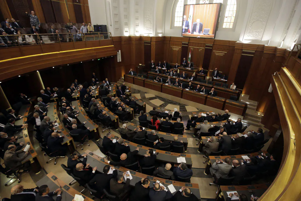 Lebanese members of parliament gather to elect the new Lebanese president in the parliament building in downtown Beirut on April 23, 2014. Lebanon's parliament failed to elect a new president, with no candidate securing the two-thirds of the vote needed to win and many lawmakers leaving their ballots blank. (Joseph Eid/AFP/Getty Images)