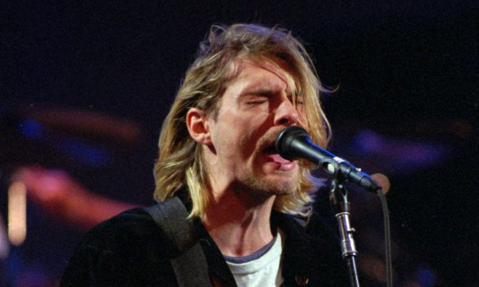 File photo shows Kurt Cobain of the Seattle band Nirvana performing in Seattle, Wash., on Dec. 13, 1993. (Robert Sorbo, File/AP Photo)