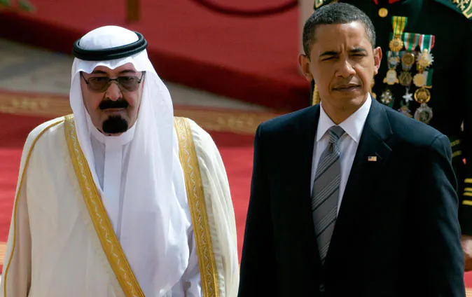 US President Barack Obama and Saudi King Abdullah bin Abdul Aziz al-Saud (L) review the honour gaurd during an arrival ceremony at the King Khaled international airport in Riyadh on June 3, 2009. Obama arrived in Saudi Arabia at the start of a mission to the Middle East where he will reach out to the world's Muslims and promote peace. Saudi Arabia laid on a red carpet welcome for Obama, who is due to hold talks with King Abdullah before heading to Egypt on June 4 to give a much-anticipated address to the Muslim world at Cairo University. (Saul Loeb/AFP/Getty Images)