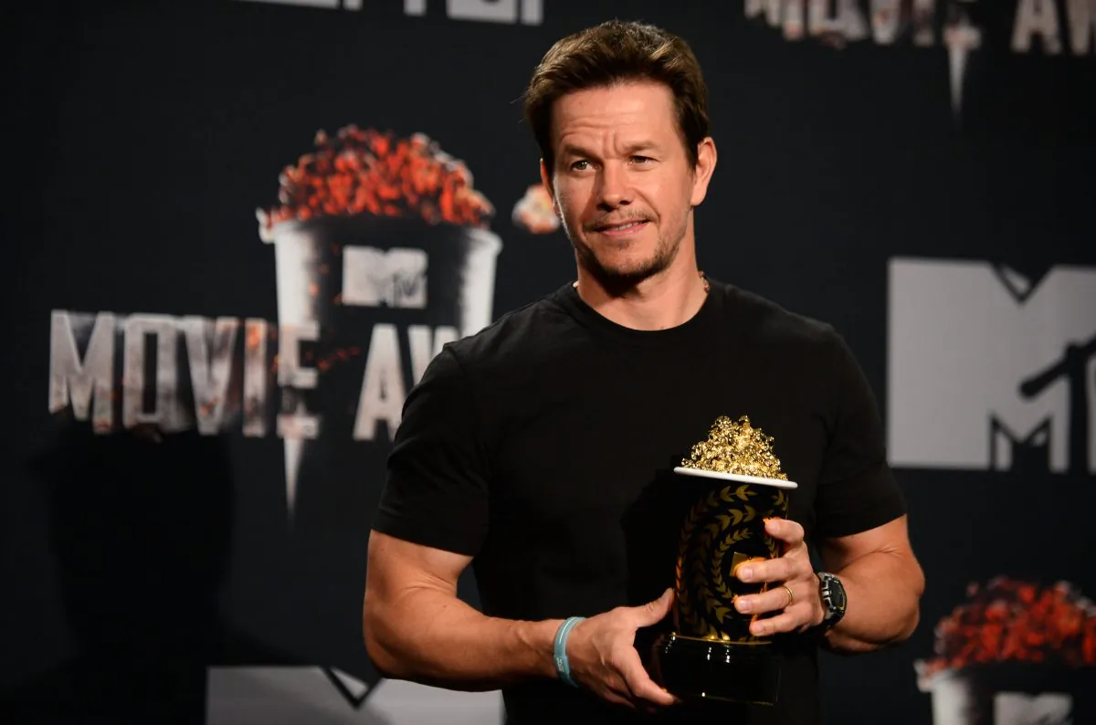 Mark Wahlberg poses in the press room on Sunday, April 13, 2014, at Nokia Theatre in Los Angeles. (Photo by Jordan Strauss/Invision/AP)