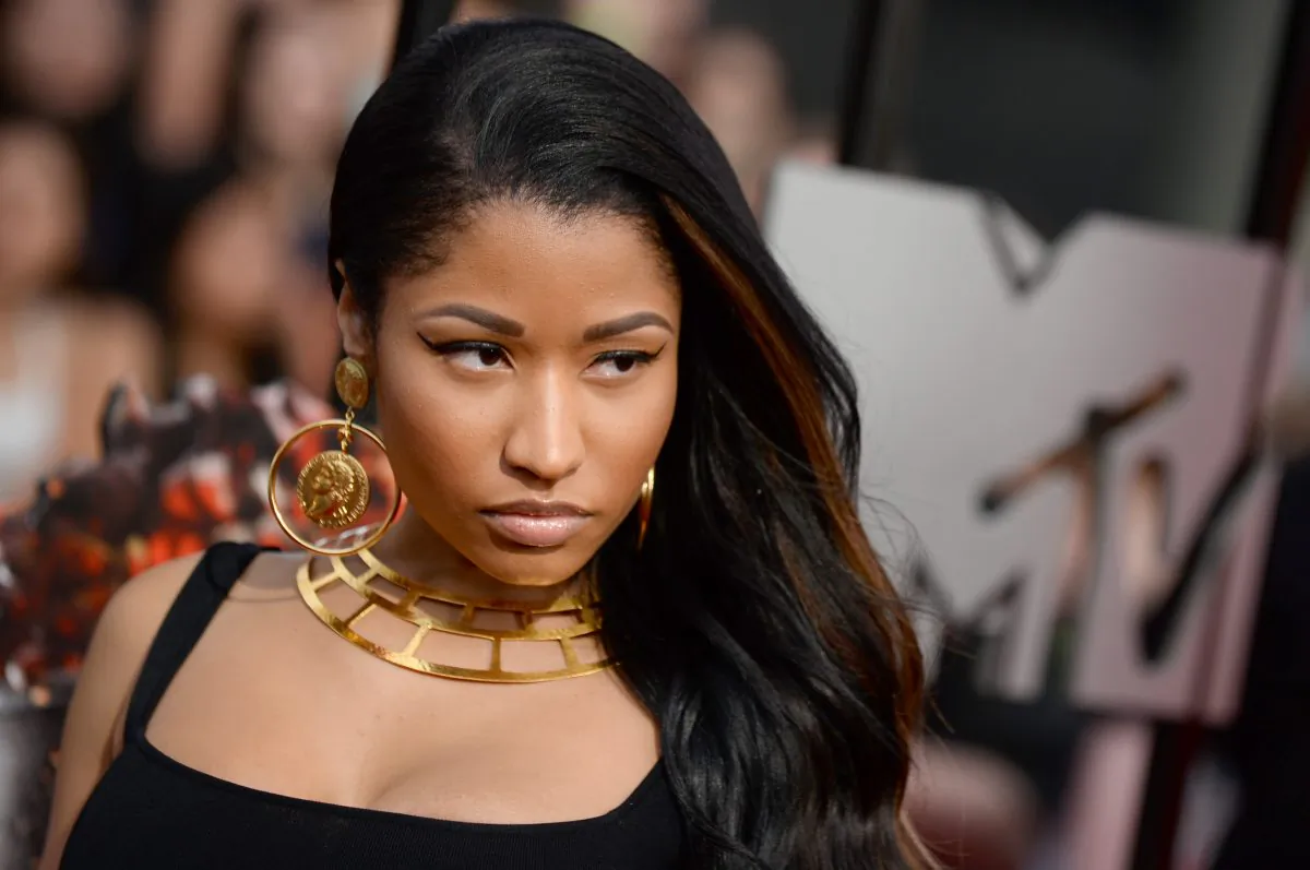 Nicki Minaj arrives at the MTV Movie Awards on Sunday, April 13, 2014, at Nokia Theatre in Los Angeles. (Photo by Jordan Strauss/Invision/AP)