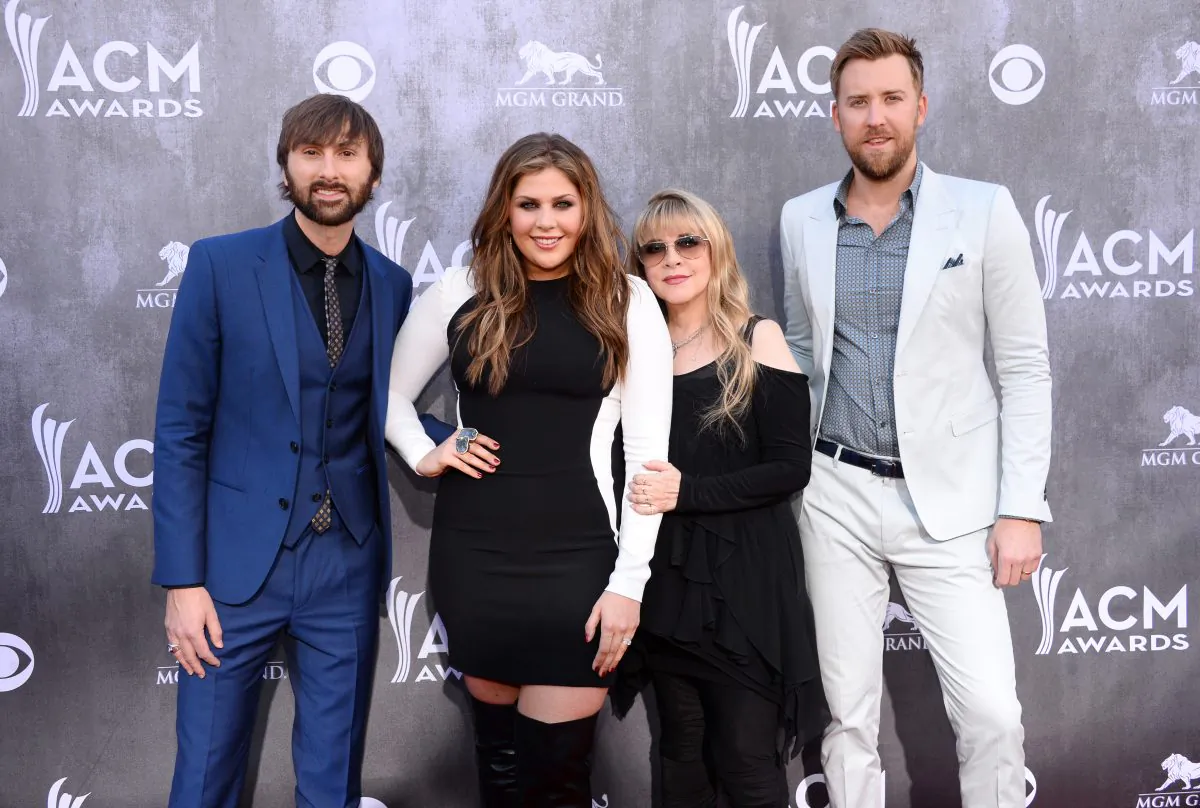 Stevie Nicks, second from right, and from left, Dave Haywood, Hillary Scott and Charles Kelley, of the musical group Lady Antebellum, arrive at the 49th annual Academy of Country Music Awards at the MGM Grand Garden Arena in Las Vegas on April 6, 2014. (Al Powers/Powers Imagery/Invision/AP)