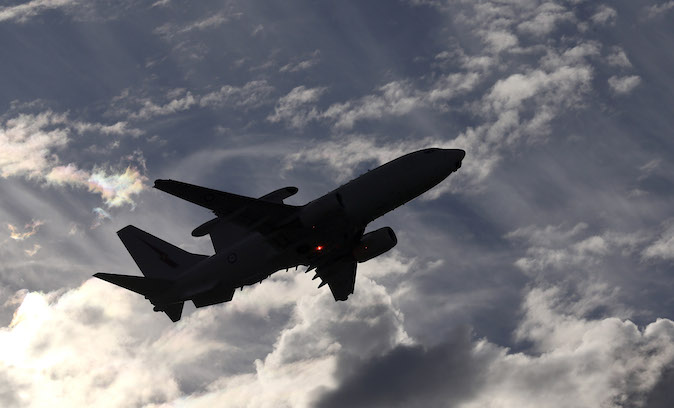 A Royal Australian Air Force E-7A Wedgetail takes off from Perth Airport on route to conduct search operations for wreckage and debris of missing Malaysia Airlines Flight MH370 in Southern Indian Ocean, near the coast of Western Australia, Saturday, April 5, 2014. Eleven military planes, four civil jets and 11 ships including ADV Ocean Shield and HMS Echo will today search an area of 217,000 square kilometers, 1700 kilometers west of Perth.(AP Photo/Rob Griffith)