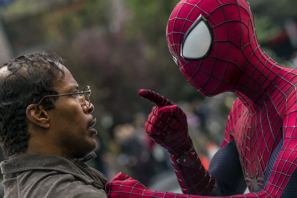 Spider-Man gives his "greatest fan" (Jamie Foxx) a good lecturing. (Sony Pictures)
