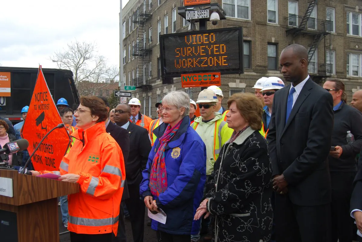 New York City Transportation Commissioner Polly Trottenberg announces new technology to further work zone safety in the city with officials and representatives from unions and utilities companies at a work site next to Sunset Park in Brooklyn, New York, April 8, 2014. (Catherine Yang/Epoch Times)