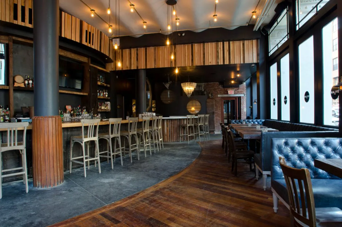 The renovation at Dylan Prime pays homage to its origins. Rustic and industrial, it features reclaimed elements from the Dietz lantern manufacturing company. (Courtesy of Dylan Prime)