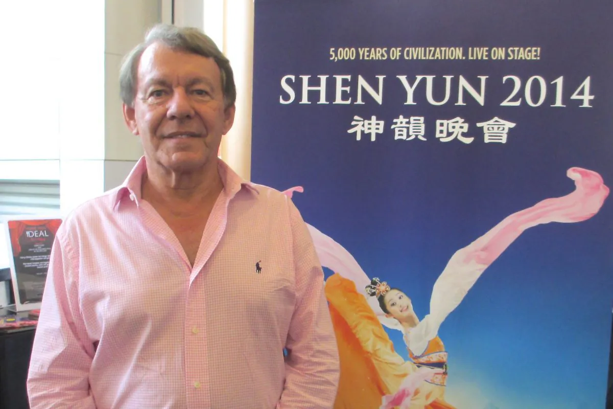 Daniel Giron enjoys Shen Yun Performing Arts at the Gold Coast's Arts Theatre, on April 27. (Terri Lee/Epoch Times)