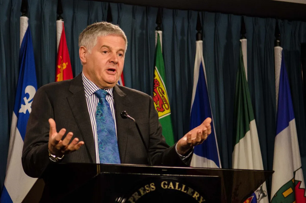 Frank Clegg, CEO of Canadians for Safe Technology and former president of Microsoft Canada, criticizes the Royal Society of Canada’s report on wireless airwaves during a press conference on Parliament Hill on April 1, 2014. The Royal Society has approved draft revisions to federal guidelines setting safe exposure levels of radiofrequency waves. (Matthew Little/Epoch Times)
