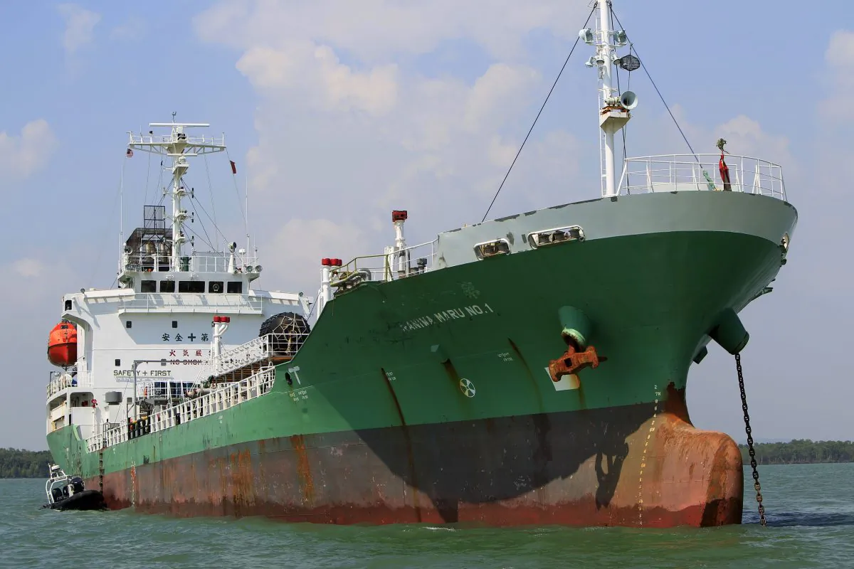 Singapore-owned tanker Naniwa Maru 1 is anchored at Klang port, Malaysia, Wednesday, April 23, 2014 after being robbed by pirates. (AP Photo/Lai Seng Sin)