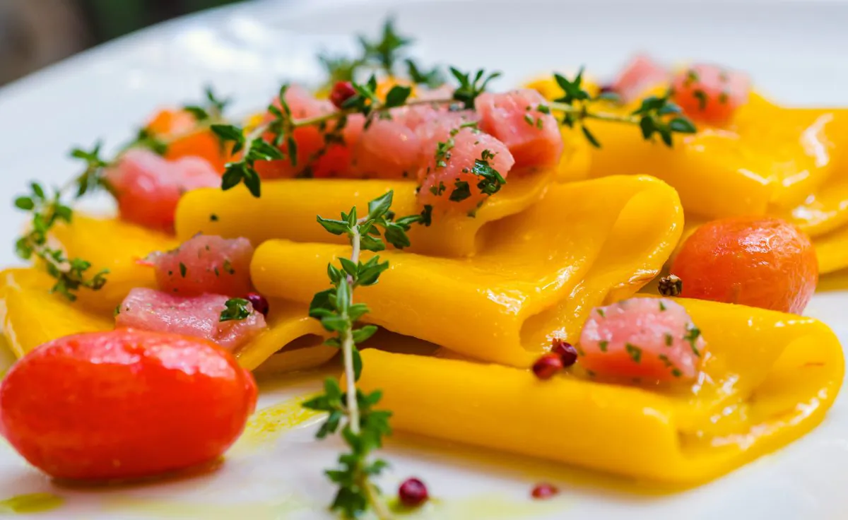 Paccheri al Tonno: artisanal pasta, yellowfin tuna, saffron, green asparagus, and bread crumbs. (Courtesy of Dopo East)