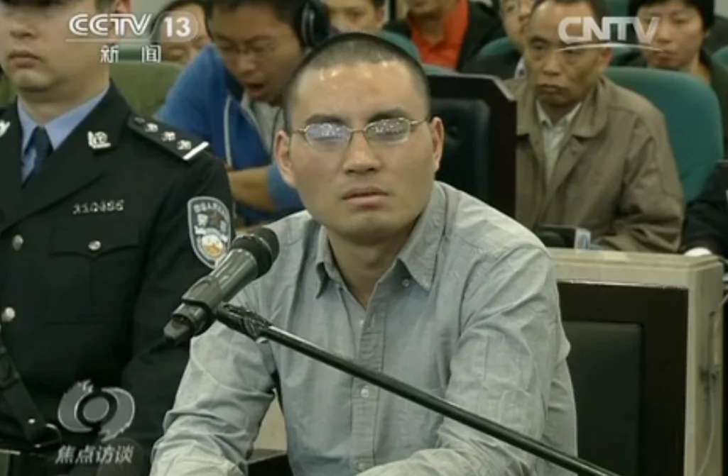 A microblogger who goes by the name of Qin Huohuo online plead guilty to all charges at trial on April 11, 2014, in Beijing. He was accused of using the Internet to spread rumors. (Screenshot/CCTV)