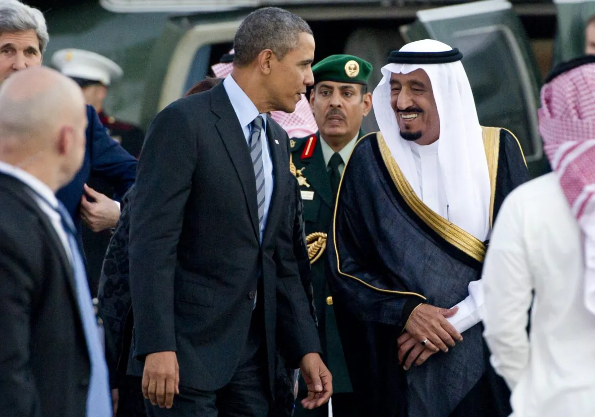 U.S. President Barack Obama (C-L) is greeted by Saudi Crown Prince Salman bin Abdulaziz al-Saud (C-R) upon his arrival, ahead of a meeting with Saudi King Abdullah, on March 28, 2014. (Saul Loeb/AFP/Getty Images)