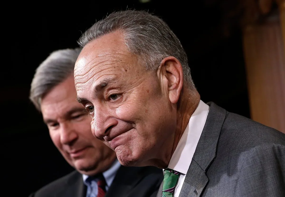 U.S. Sen. Charles Schumer (D-NY) (R) and Sen. Sheldon Whitehouse (D-RI) (L) during a press conference at the U.S. Capitol in Washington, D.C., on April 2, 2014. They spoke on the recent U.S. Supreme Court decision on campaign financing, McCutcheon v. F.E.C. (Win McNamee/Getty Images)