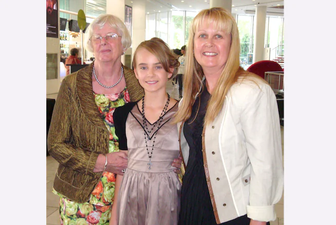 (L to R) Angela Farrell, Olivia and Helen Hall enjoy Shen Yun Performing Arts at Auckland's ASB Theatre, on April 12. (Margo McVicar/Epoch Times)