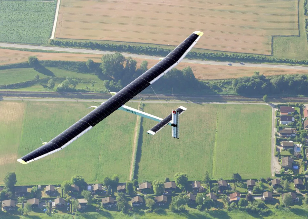 Solar Impulse's Chief Executive Officer and pilot Andre Borschberg fly in the solar-powered HB-SIA prototype airplane during its first successful night flight attempt at Payerne airport July 8, 2010. (Denis Balibouse/AFP/Getty Images)