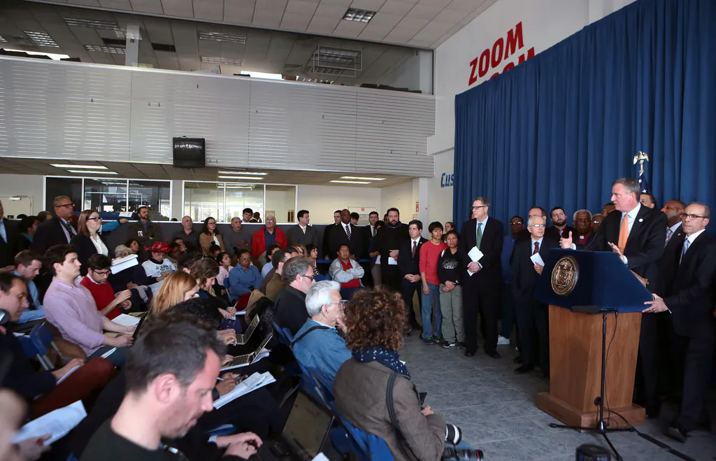 Mayor Bill de Blasio makes a Sandy announcement on Staten Island, April 17. Congressman Michael Grimm, who represents Staten Island and has been a vocal critic of de Blasio’s handling on the Sandy recovery, was notably absent. (Ed Reed for the Office of Mayor Bill de Blasio)