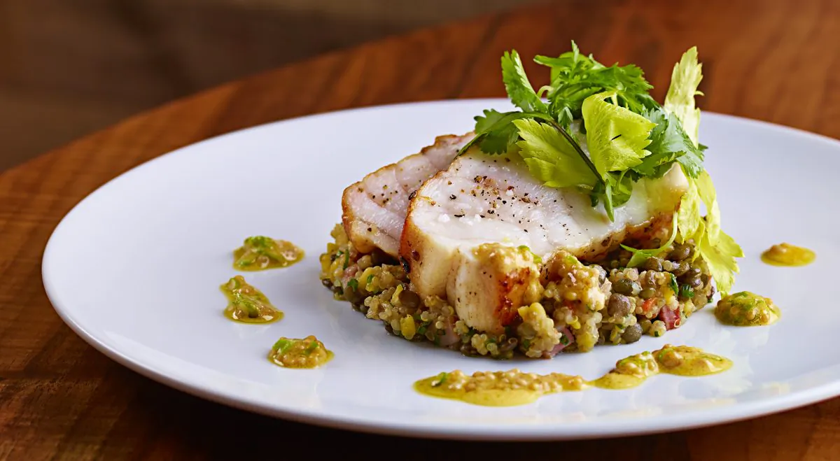 TESSA's roasted monkfish loin, with lentils, quinoa, and pancetta pilaf, and mustard agrodulce. (Courtesy of TESSA)