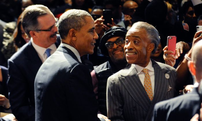 President Barack Obama, left, shakes hands with audience members as Spike Lee, center, and Rev. Al Sharpton stand by at the National Action Network conference Friday, April 11, 2014, in New York. (AP Photo/The Daily News, Julia Xanthos, Pool)