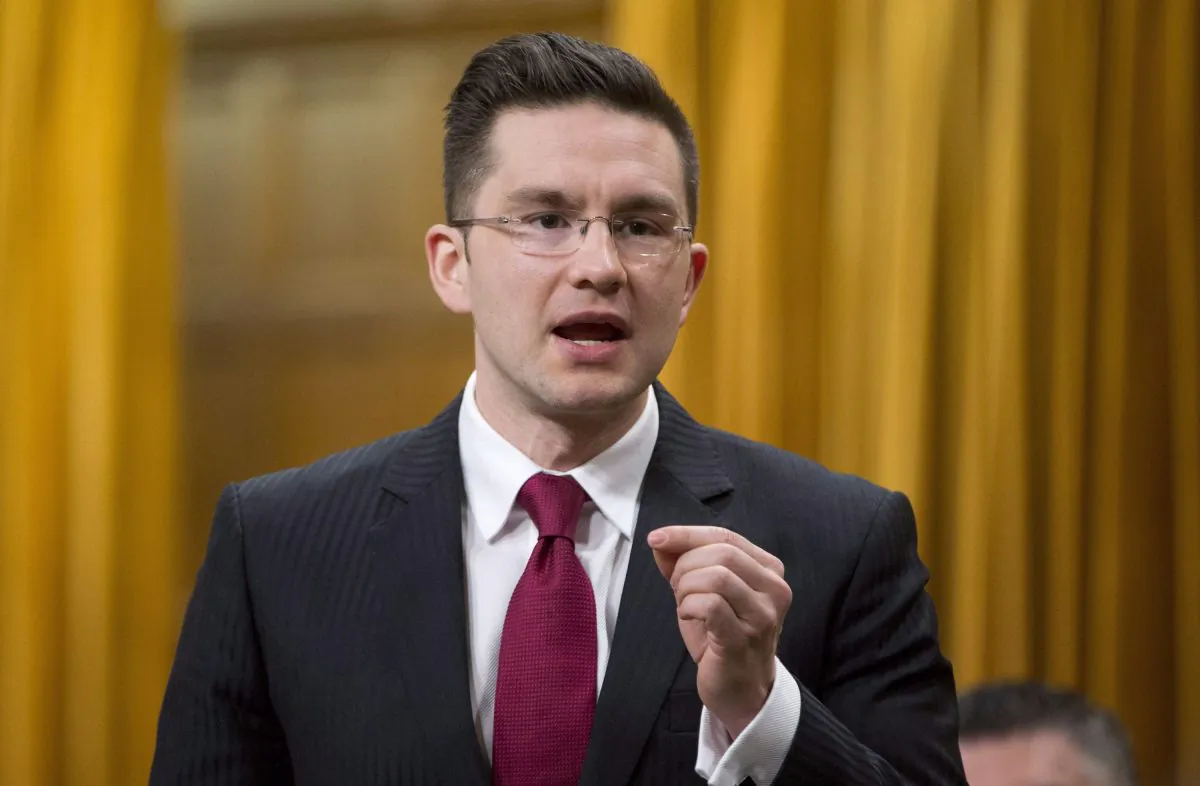 Democratic Reform Minister Pierre Poilievre responds to a question in the House of Commons on April 4, 2014. Poilievre's accusation that Mayrand is after more power and a bigger budget drew howls of protest April 8 in the House and during a Senate committee hearing. Mayrand fears Poilievre's Bill C-23 will disenfranchise tens of thousands of voters. (The Canadian Press/Adrian Wyld)