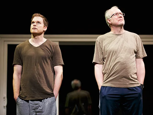 (L–R) New neighbors John Jones (Michael C. Hall) and Bob Jones (Tracy Letts) stare at the sky in a scene from Will Eno’s The Realistic Joneses. (Joan Marcus)