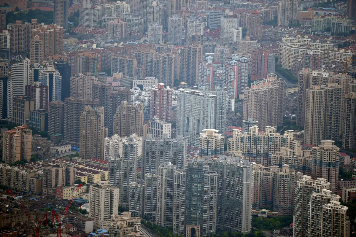 Commercial and residential real estate in Shanghai, Aug. 2, 2013. The boom in Chinese real estate is ending, leaving some investors furious.(PETER PARKS/AFP/Getty Images)
