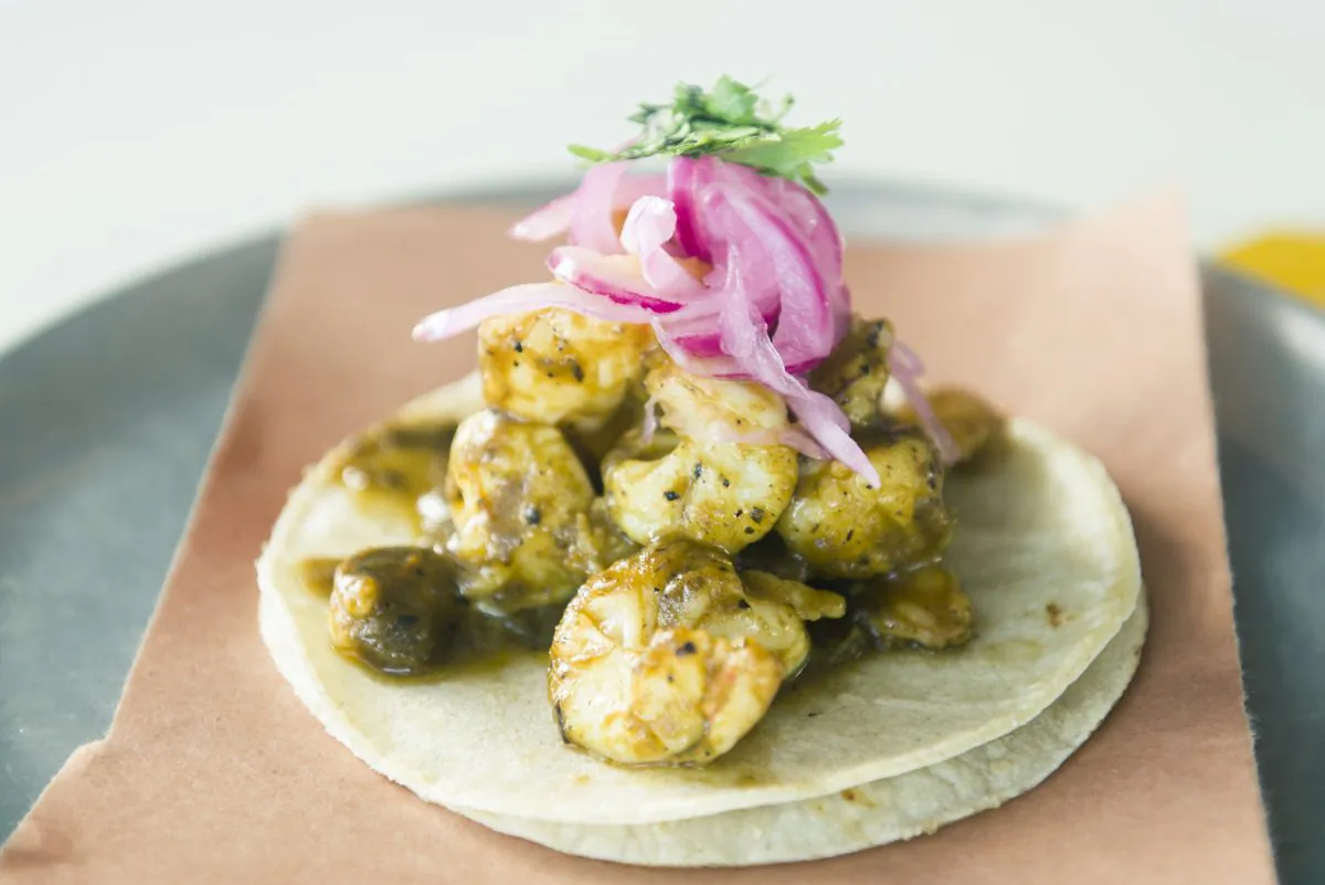 Shrimp mole tacos. (Courtesy of Tacombi)