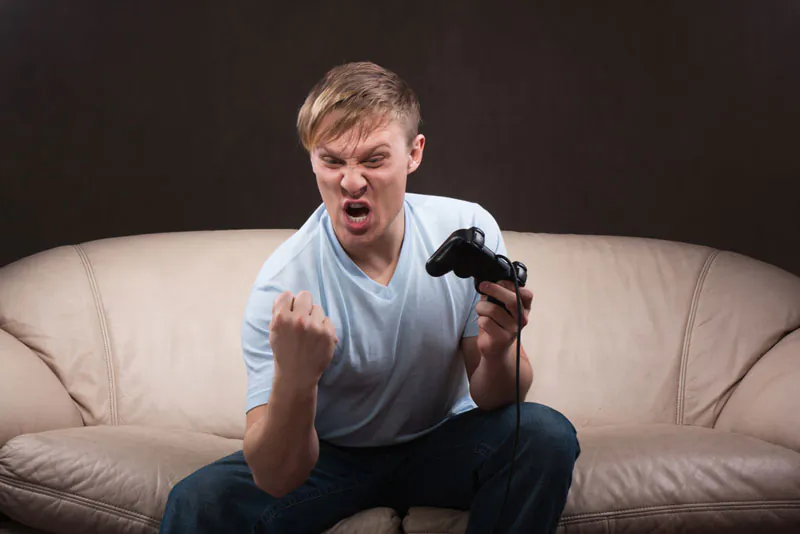 "When people feel they have no control over the outcome of a game, that leads to aggression," says Richard Ryan. "We saw that in our experiments. If you press someone's competencies, they'll become more aggressive, and our effects held up whether the games were violent or not." (Shutterstock*)