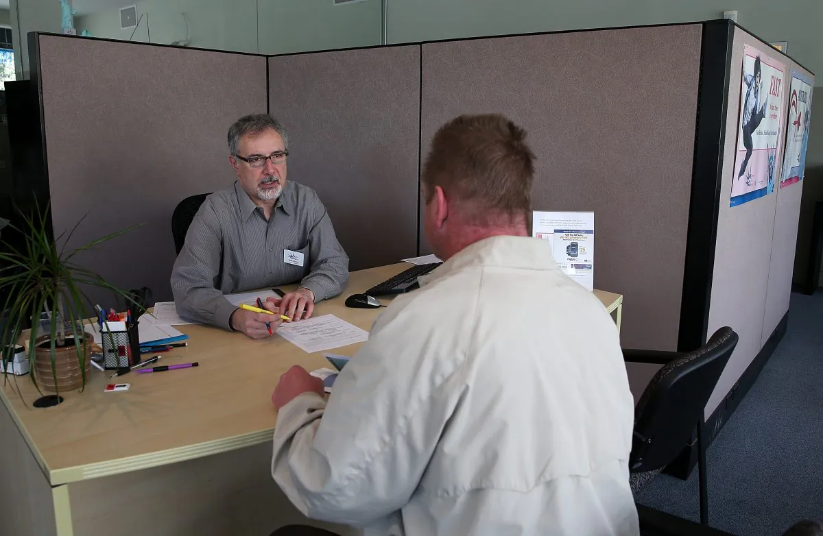 An accountant prepares a client’s tax return. If you have an amount due, it must be paid by May 5 this year, rather than the normal April 30 deadline, in order to avoid interest. (Justin Sullivan/Getty Images)